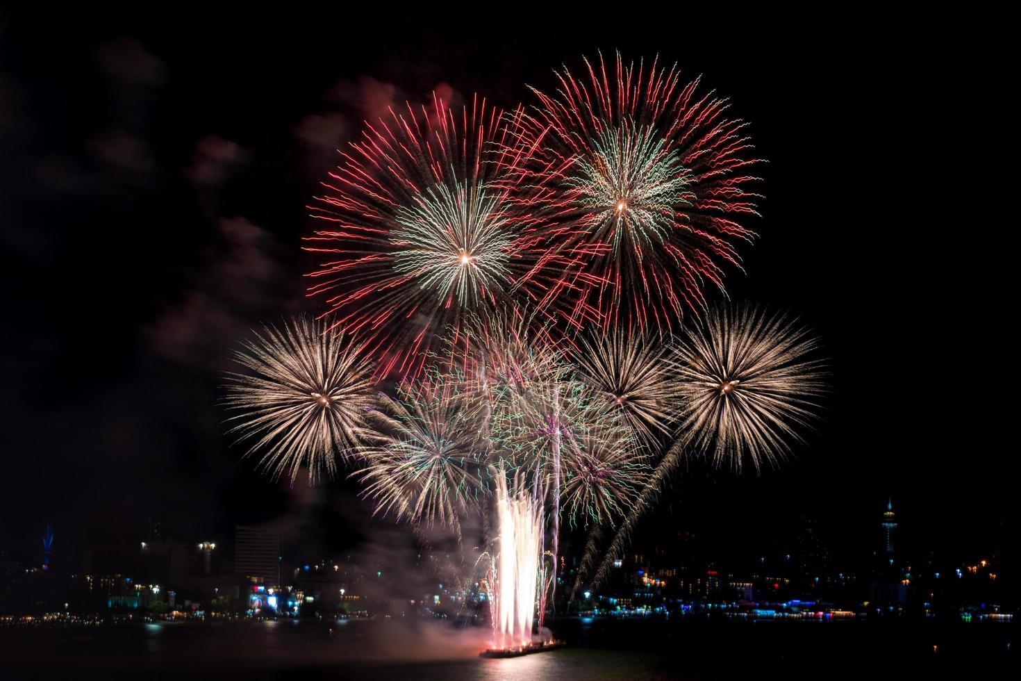 Colorful fireworks of various colors at night with celebration and anniversary concept photo