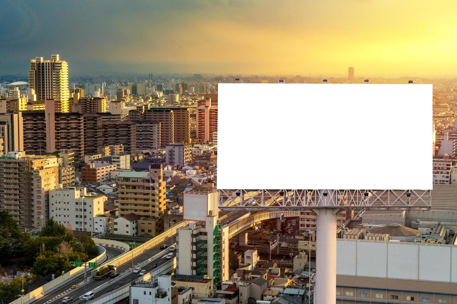 large Blank billboard ready for new advertisement with sunset photo