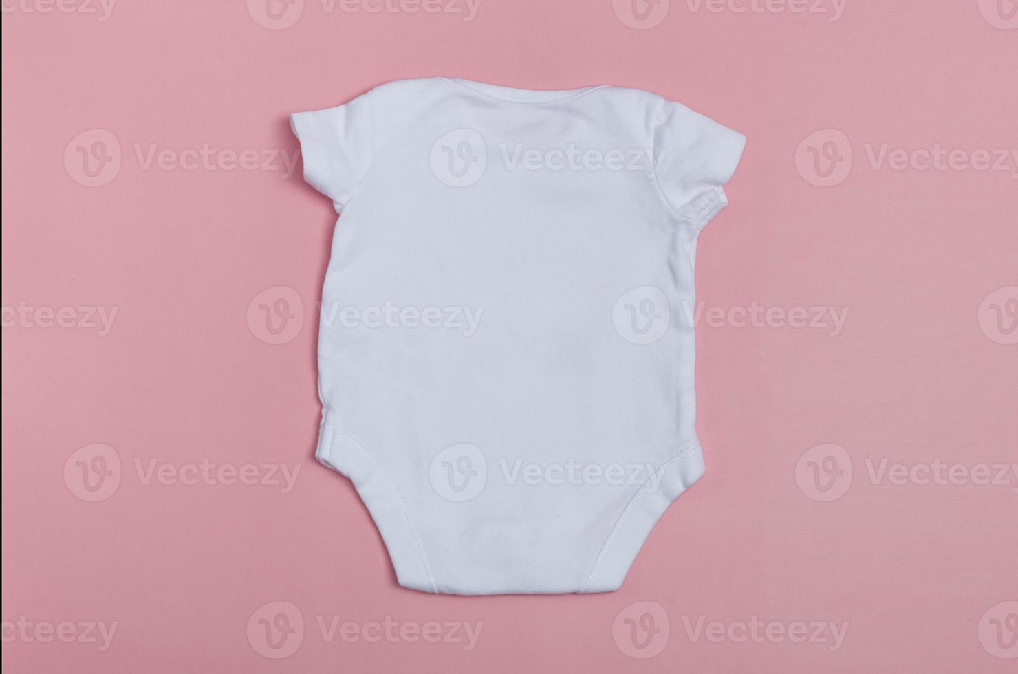 Baby body mockup, white on a colored background. Close up. photo