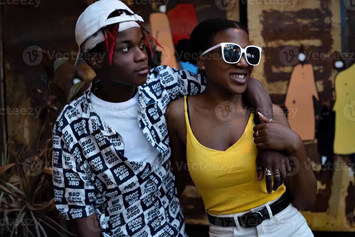 Young African American young couple enjoying a walk in the city photo