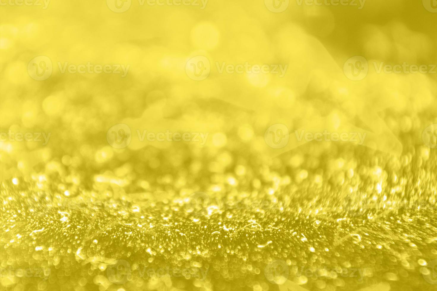 shining textured background in illuminating yellow color photo