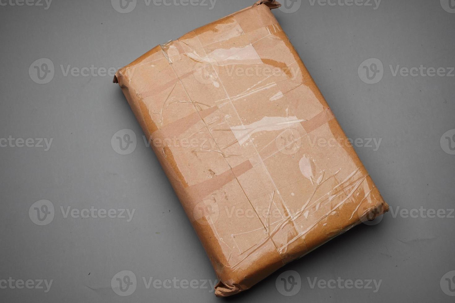 yellow paper bubble envelope on table photo
