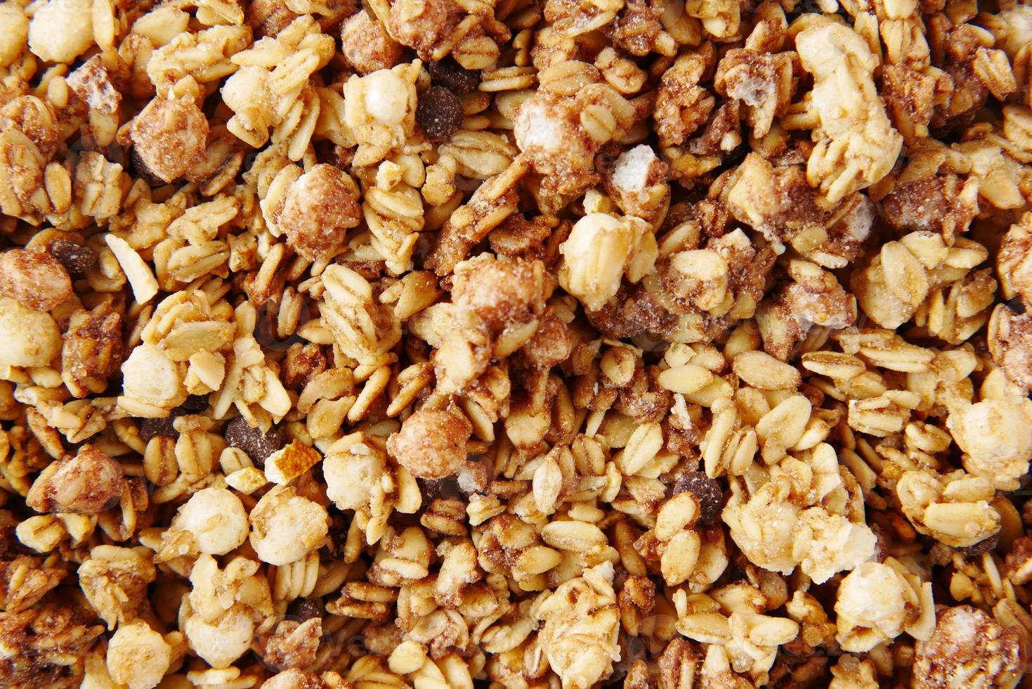 Home Made Musli in a bowl on black, photo