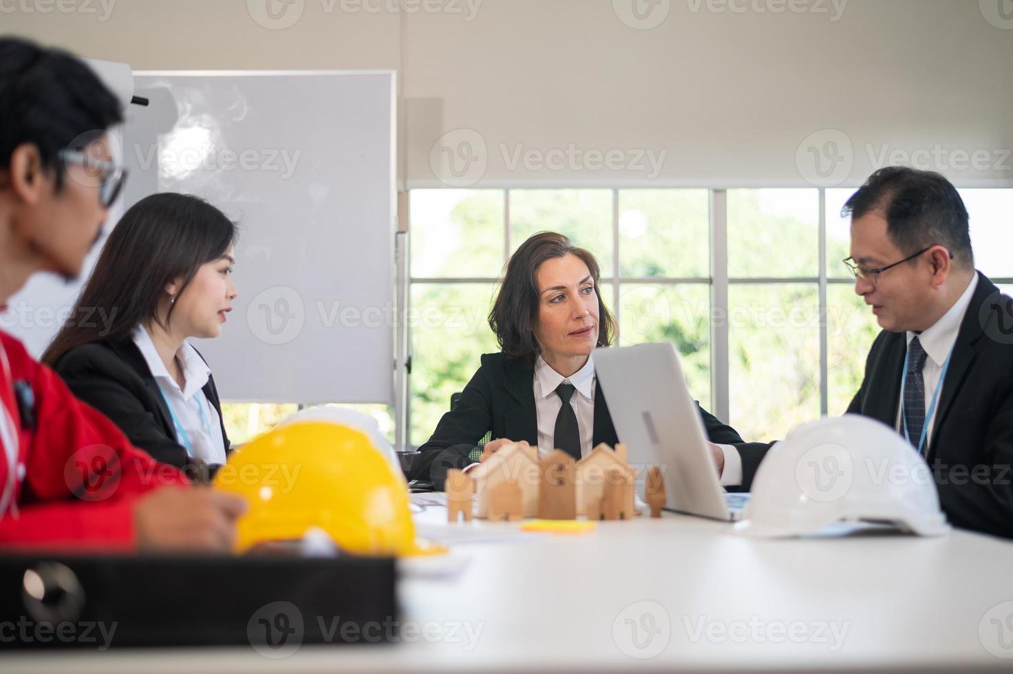 Business team and Engineer Architecture talking in meeting plan construction project photo