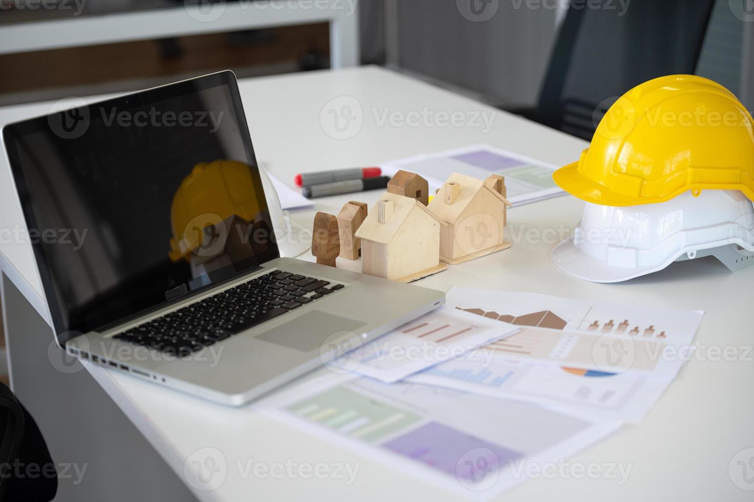 Laptop computer on desk office engineer construction or Architecture design photo