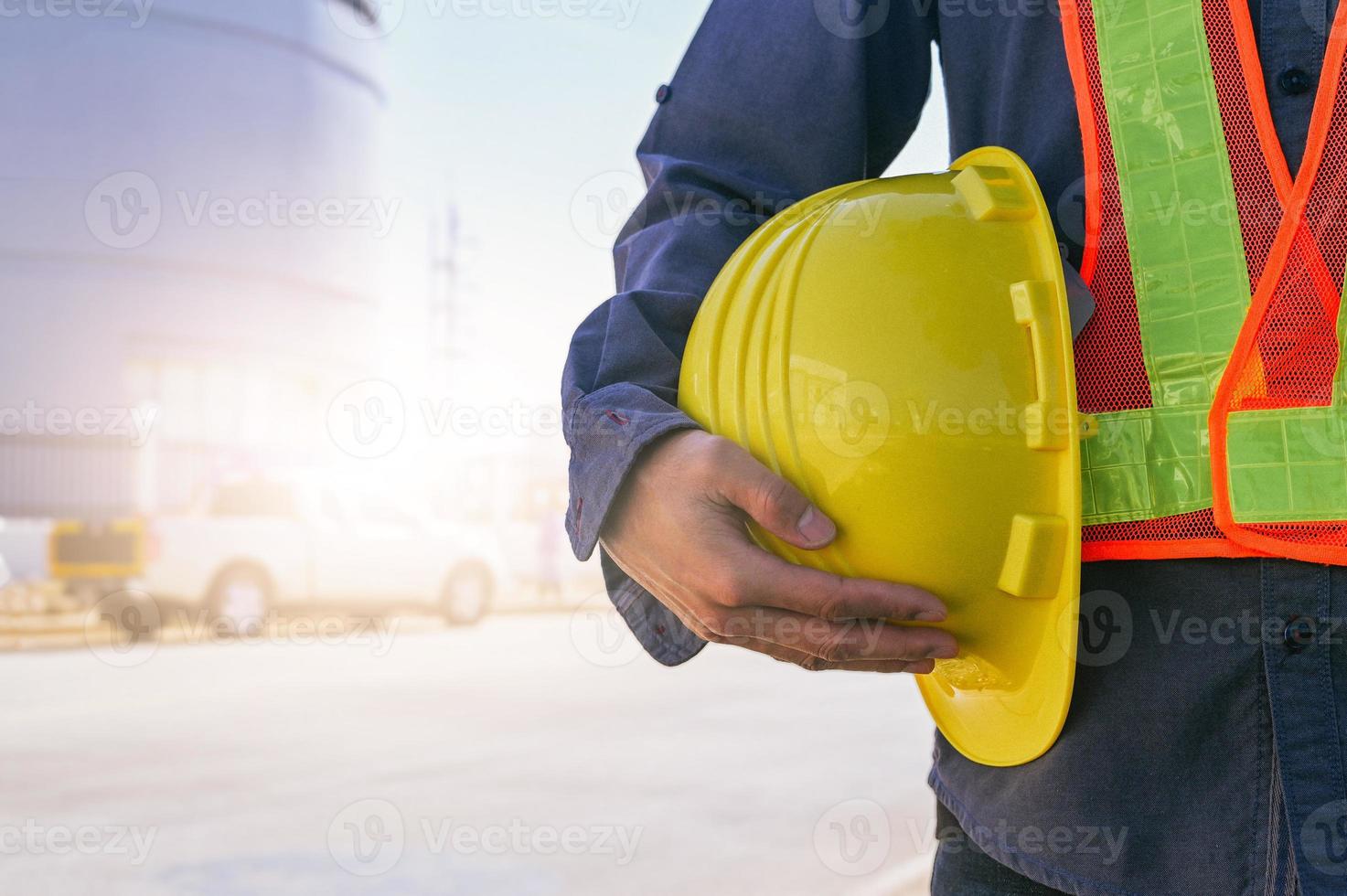 Engineer construction holding hard hat, Technician holding helmet , worker architecture with safety hard hat photo