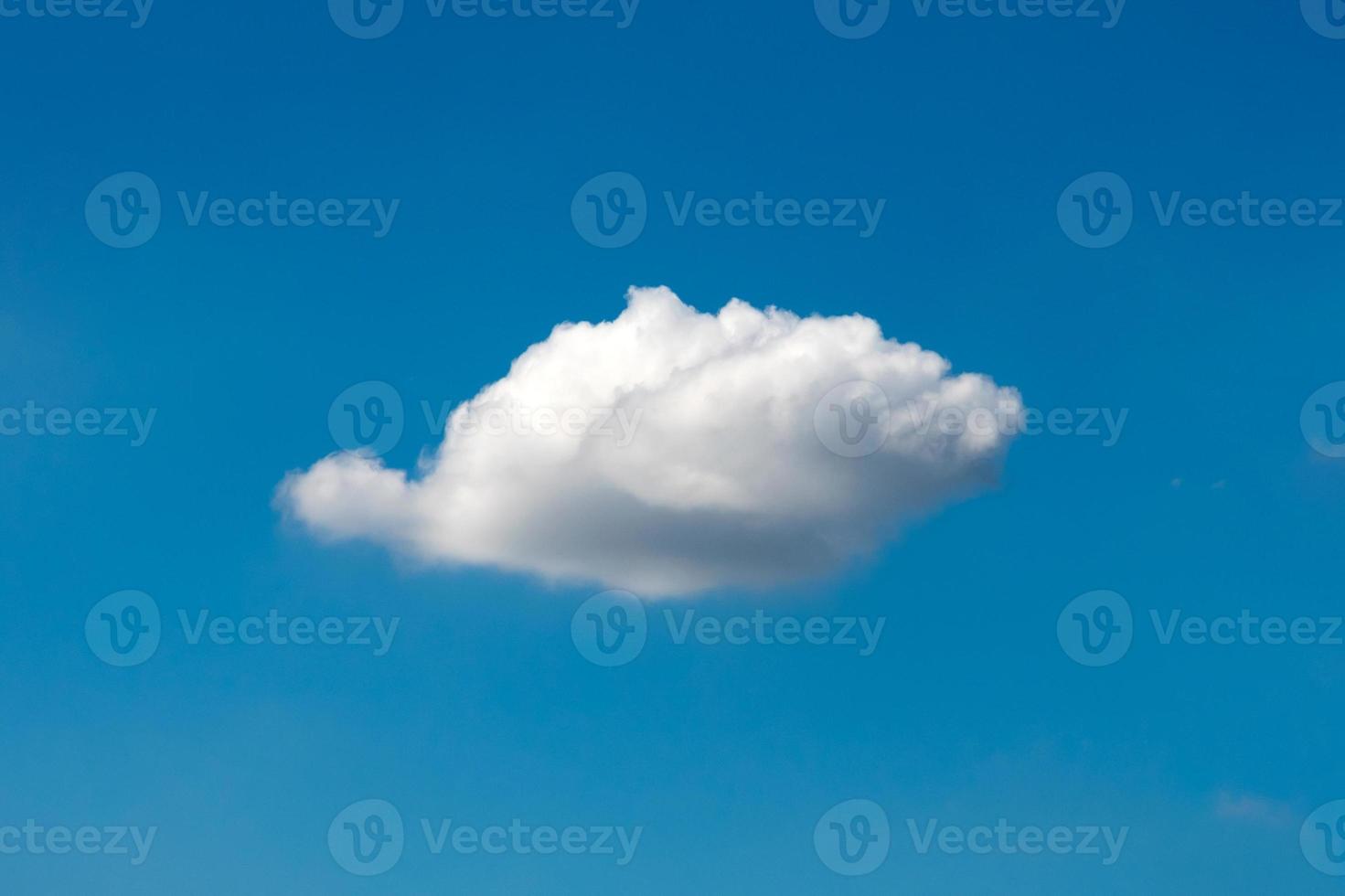 Beautiful cloudscape of nature single white cloud on blue sky background in daytime photo
