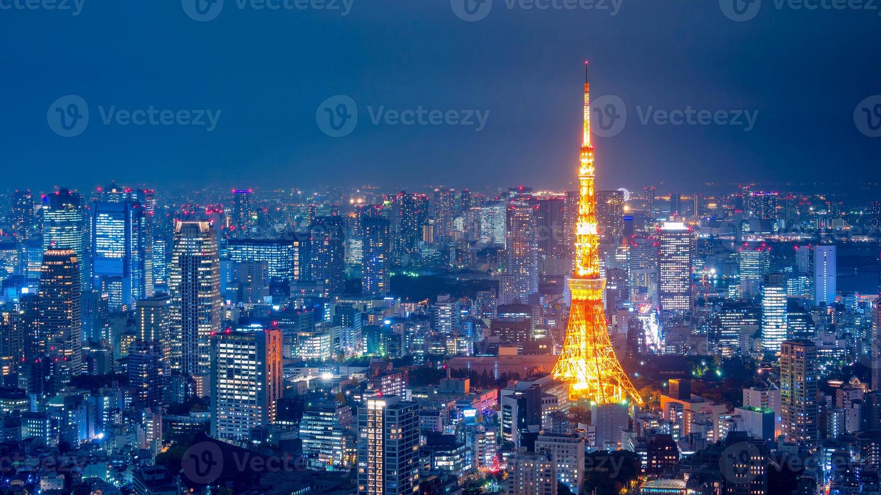 Aerial view over Tokyo tower and Tokyo cityscape view from Roppongi Hills at night. photo