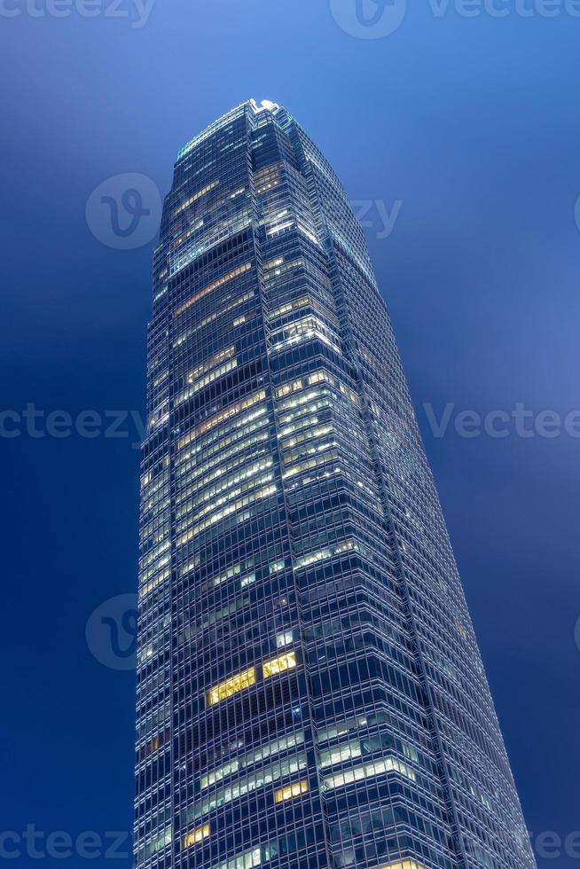 Close up view of Hong Kong landmark office building at night in Hong Kong photo