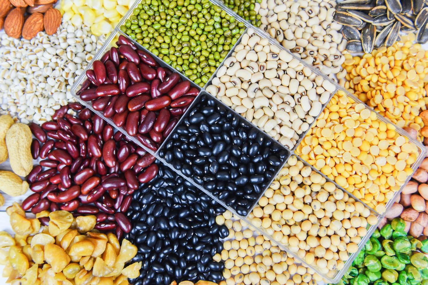 Collage various beans mix peas agriculture of natural healthy food for cooking ingredients - Box of different whole grains beans and legumes seeds lentils and nuts colorful snack texture background photo