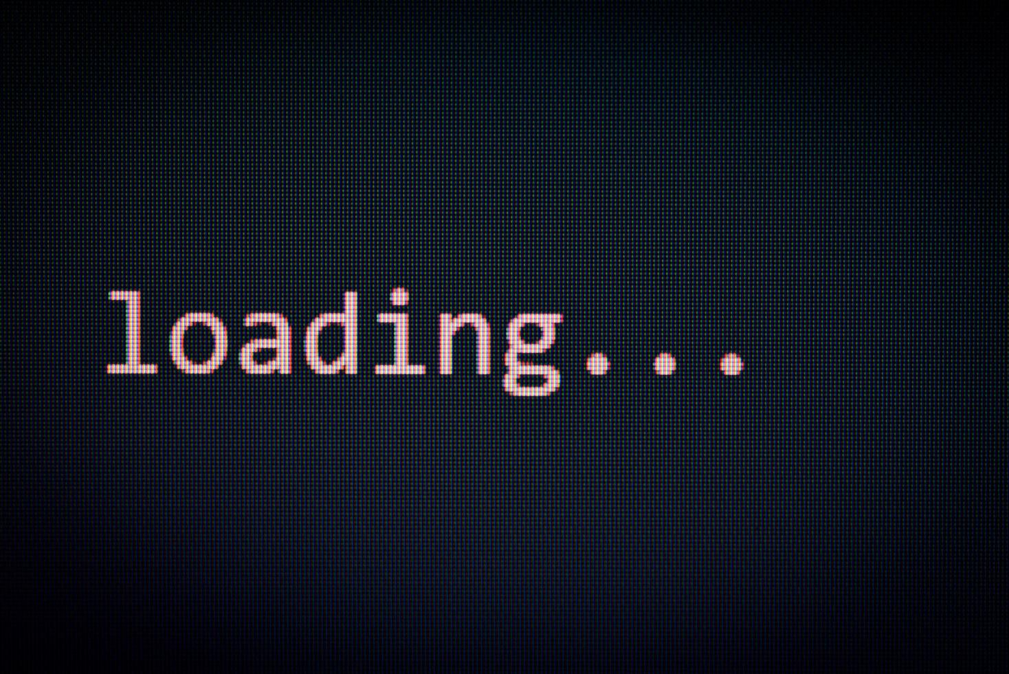 Loading message on display screen black background data progress loading complete alert computer network system software concept photo