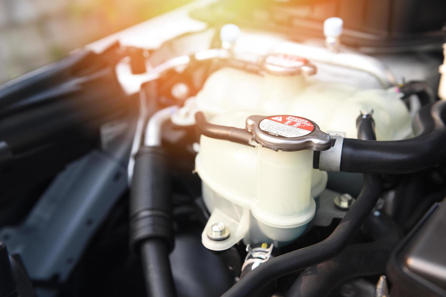 coolant car engine detail close up of machine new engine motor checking and cleaning for deliver customers in the car service photo