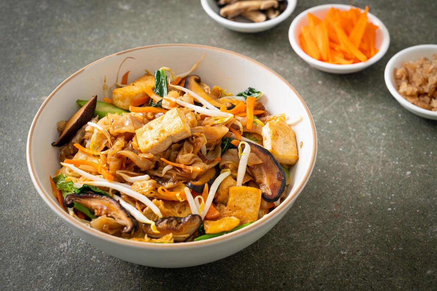 stir-fried noodles with tofu and vegetables photo