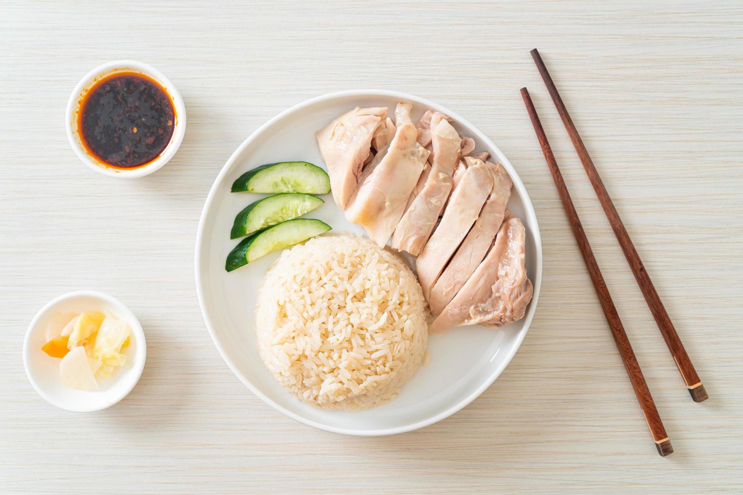 Hainanese chicken rice or rice steamed with chicken soup photo