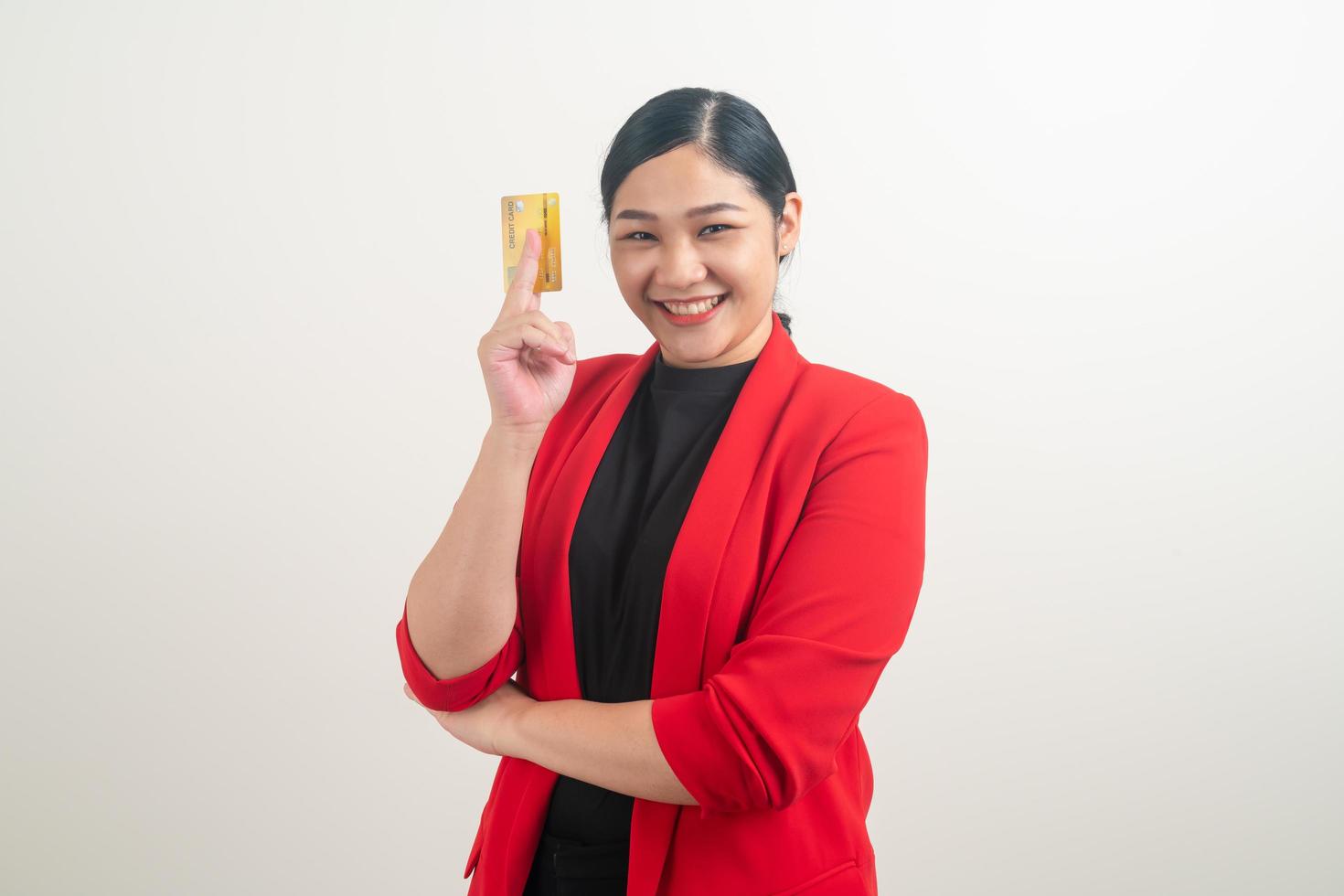 Asian woman holding credit card with white background photo