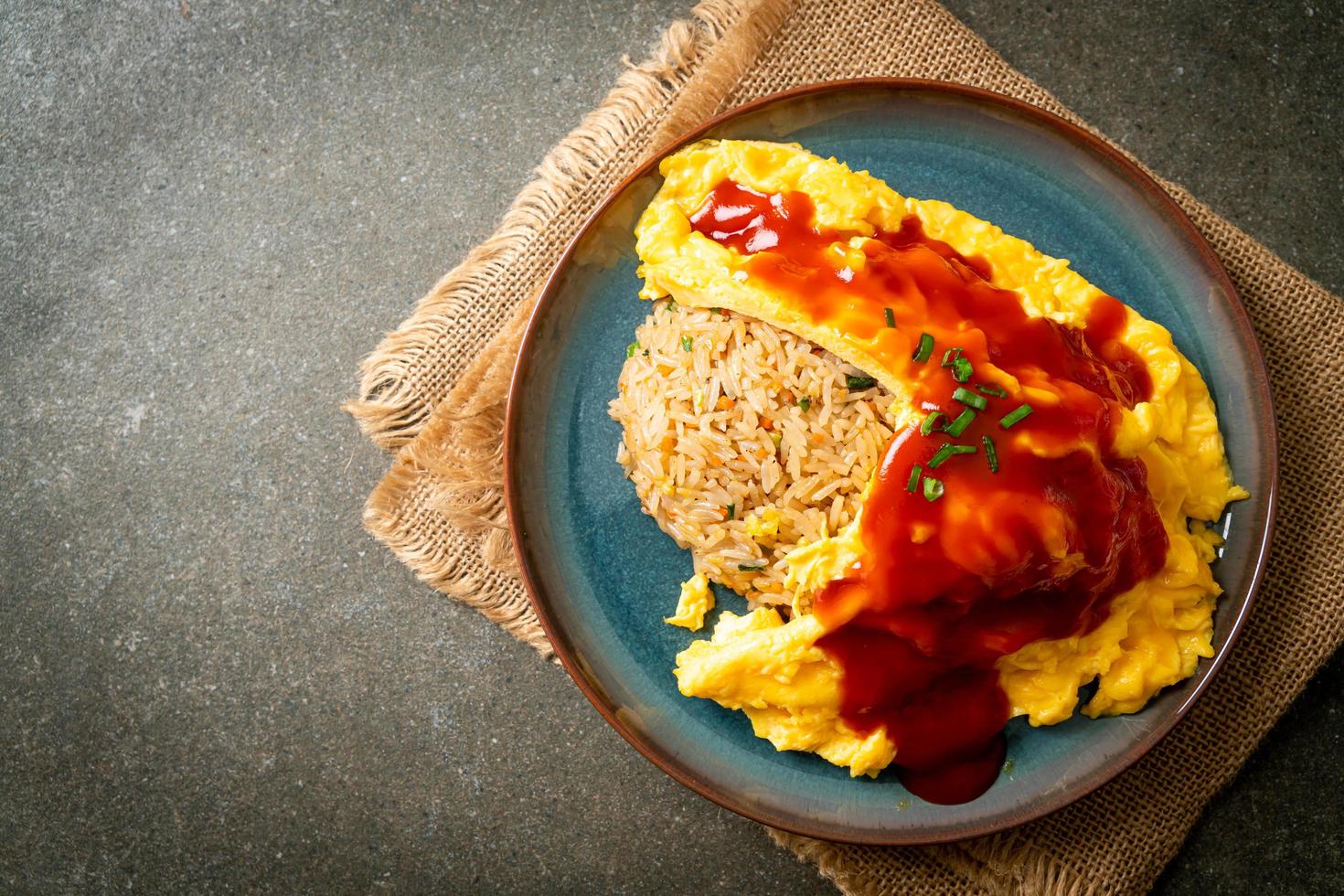 Flavored Fried Rice in an Omelet Wrapping photo