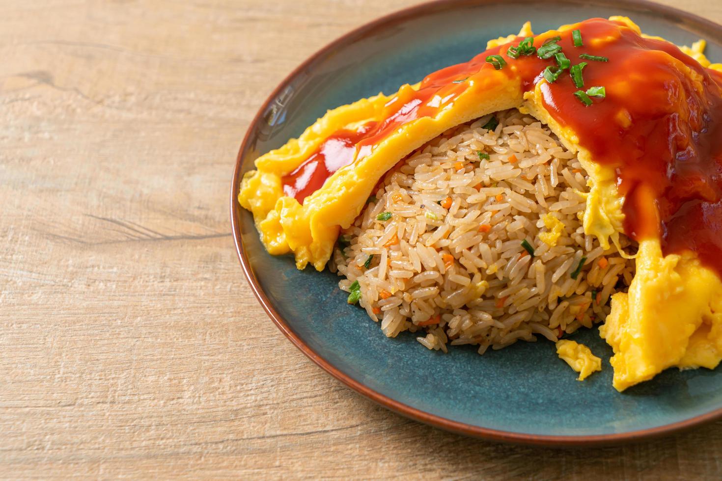 Flavored Fried Rice in an Omelet Wrapping photo