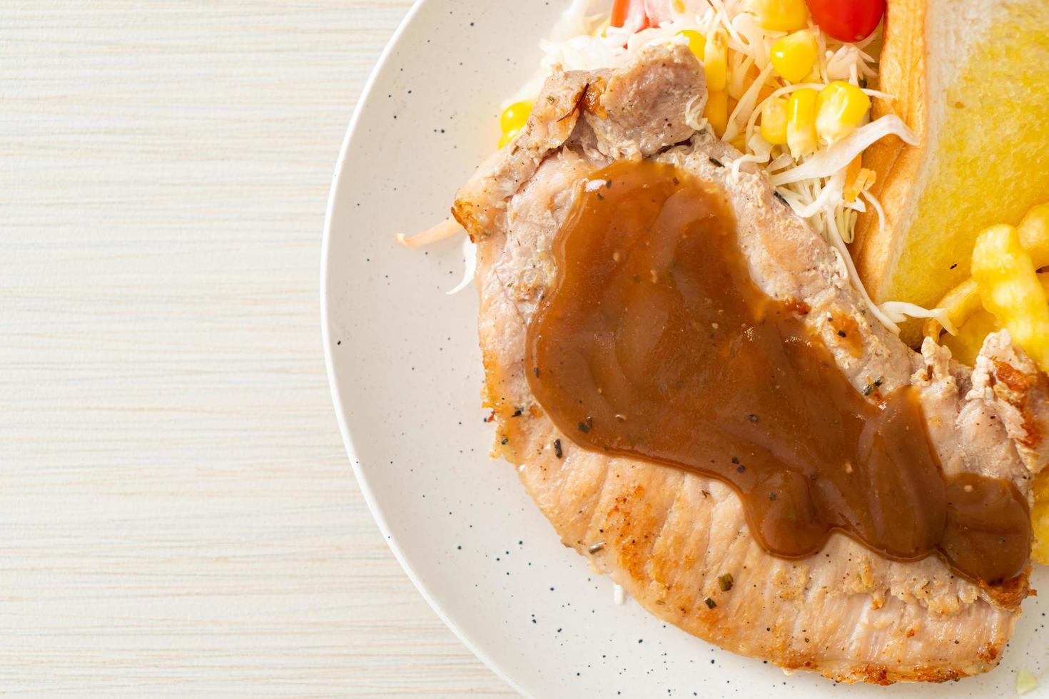 pork steak with black peppers gravy sauce photo