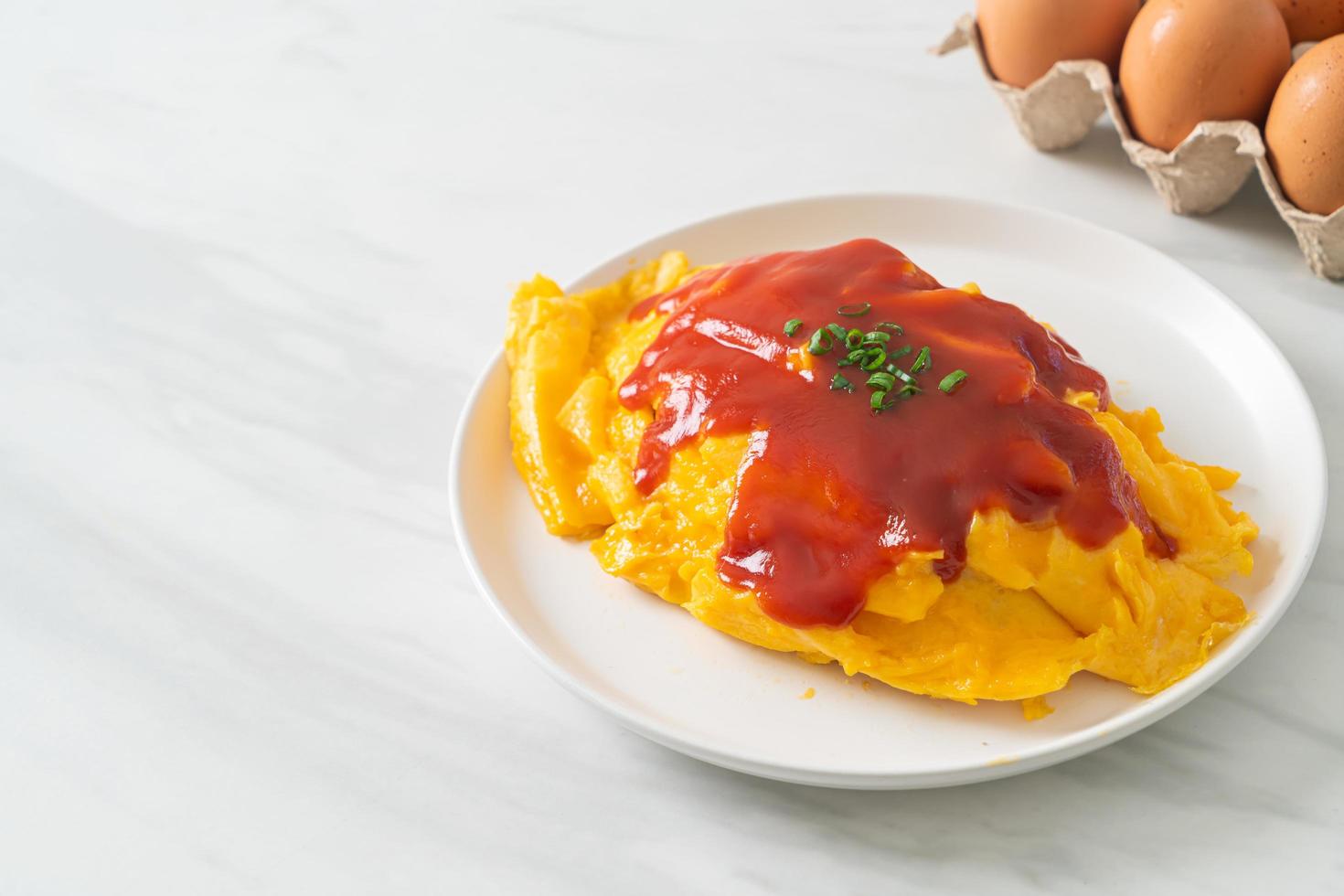 Flavored Fried Rice in an Omelet Wrapping photo