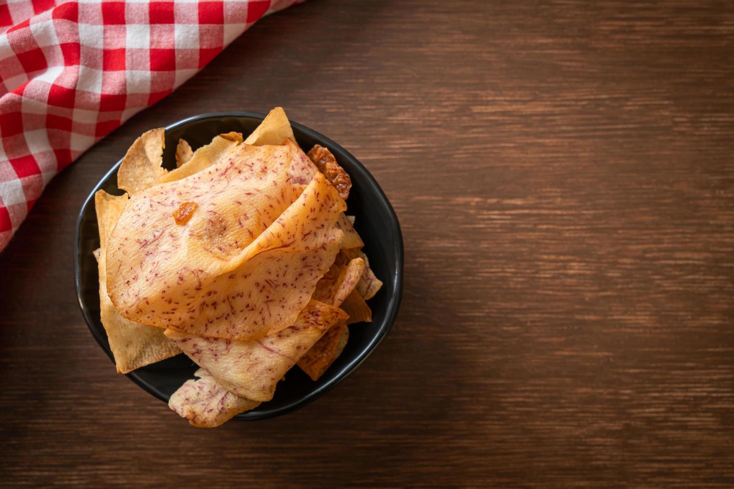 Taro Chips - fried or baked sliced taro photo