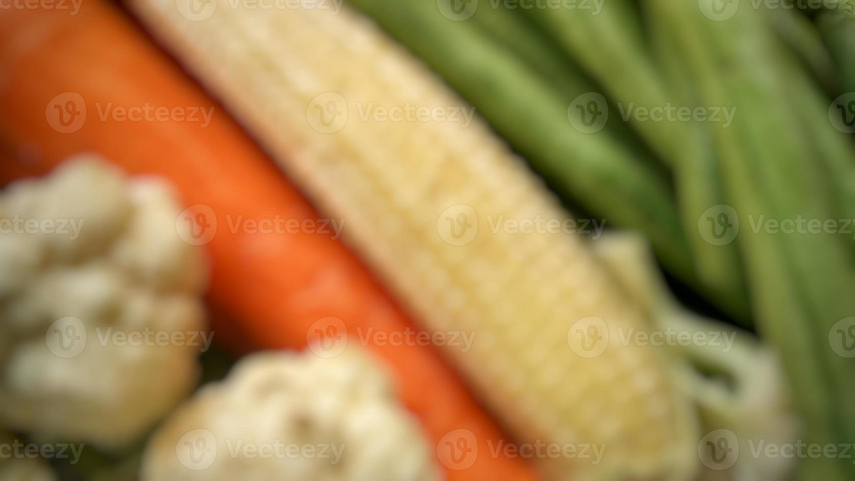 Blurred defoused vegetable chickpeas, small corn, white broccoli, green broccoli healthy food for salad photo