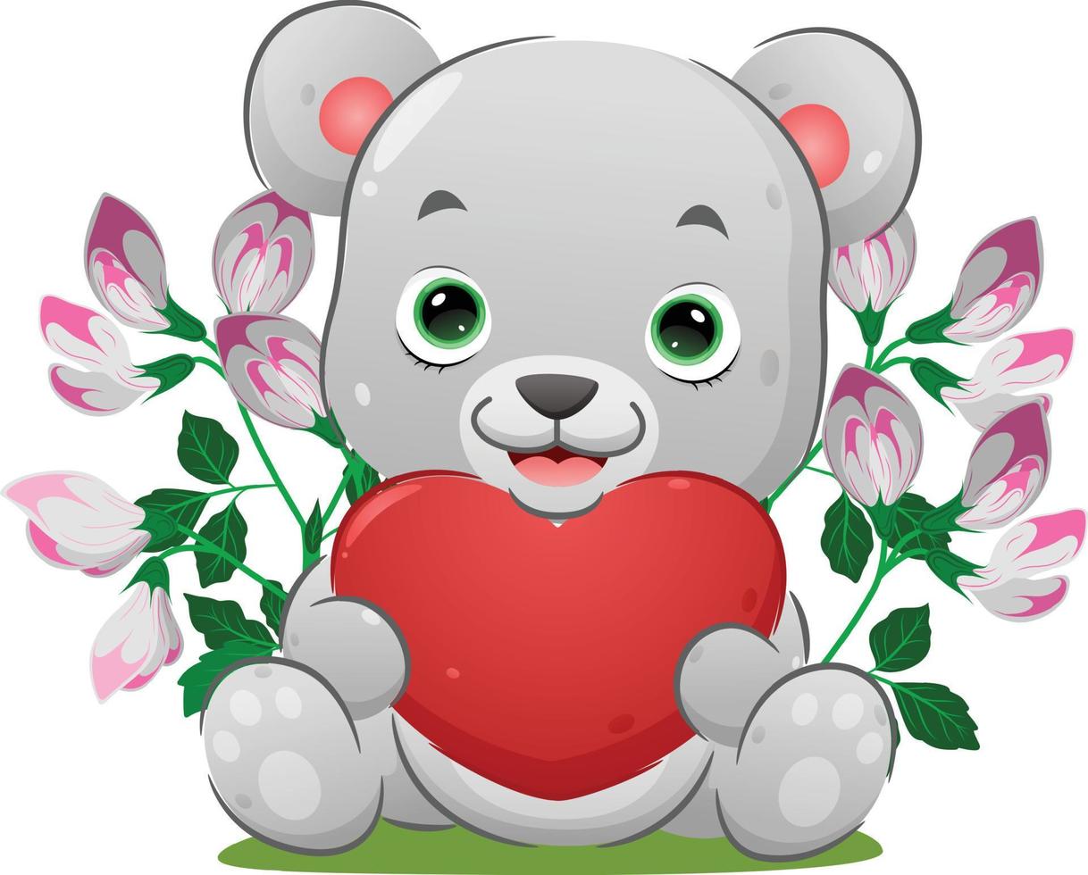 The cute bear is sitting and holding the big heart on her hand vector