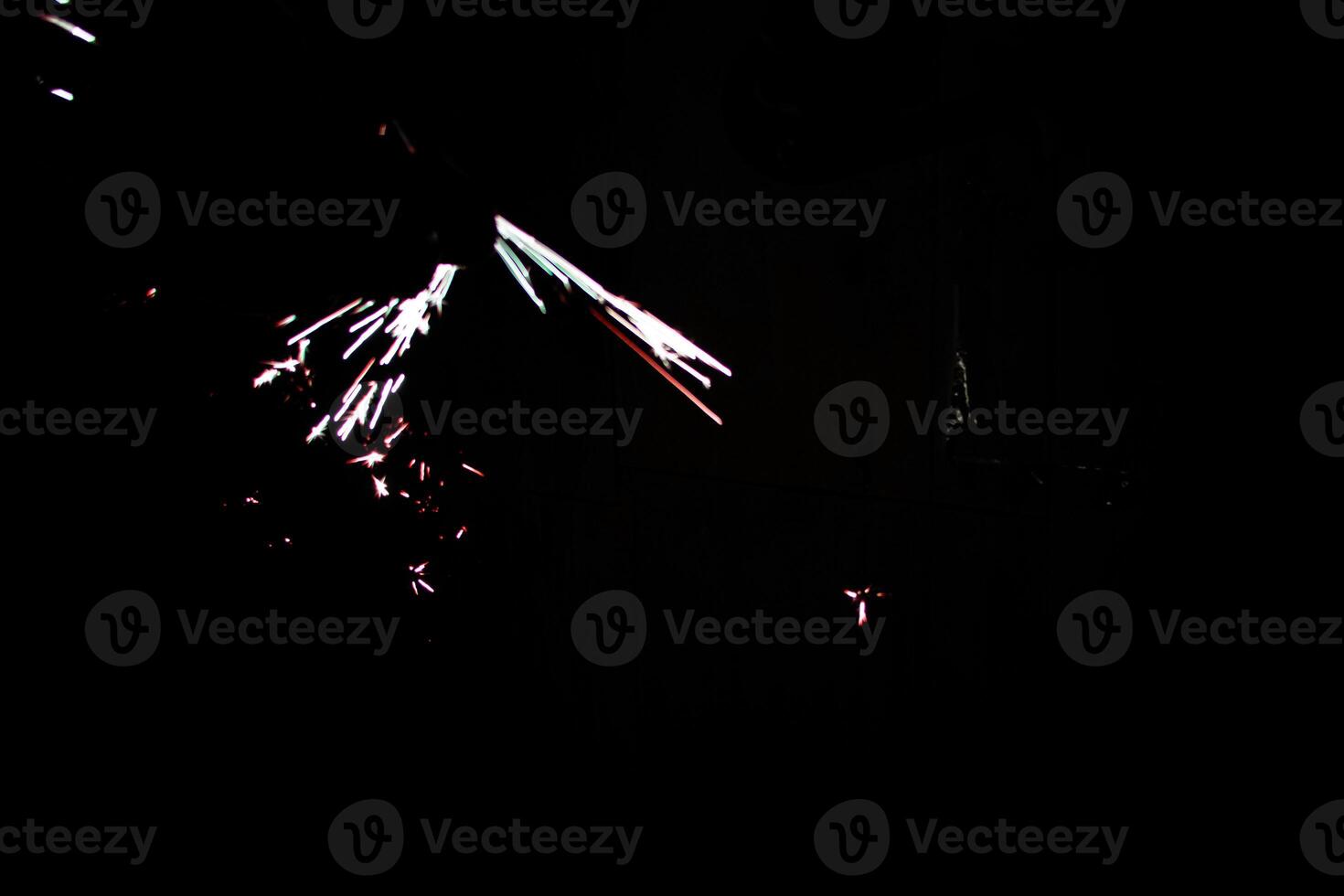 abstract sparkler overlays elegant texture blur sparkling on black. photo