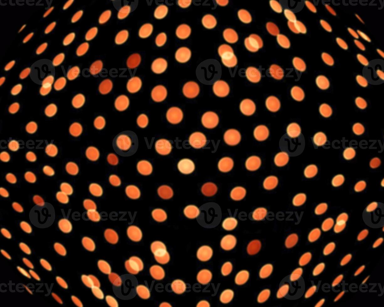 orange blur christmas lights background.abstract Lights unfocused blur light dots black . photo