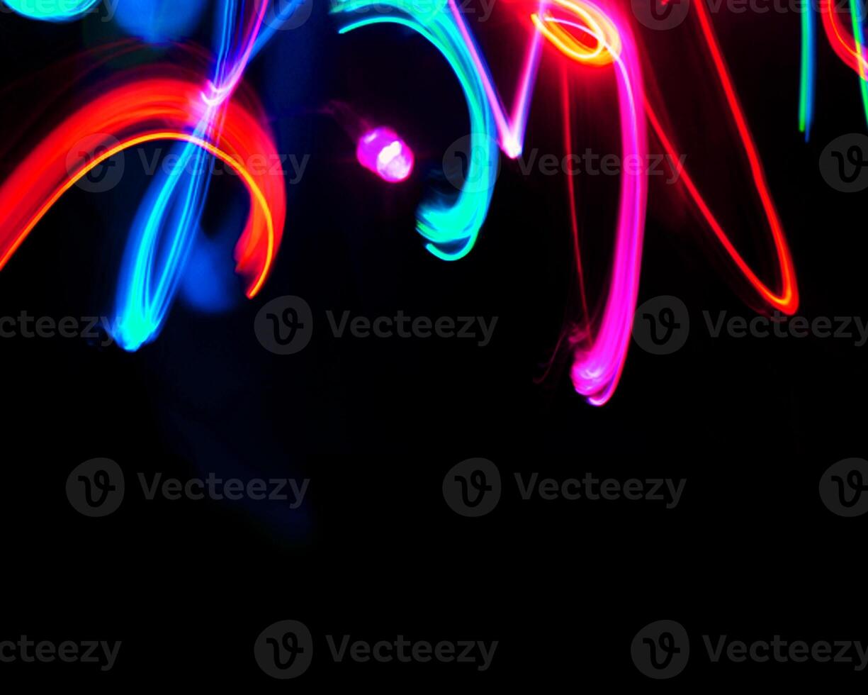 rainbow colorful blur christmas lights background.abstract Lights unfocused blur light dots black . photo