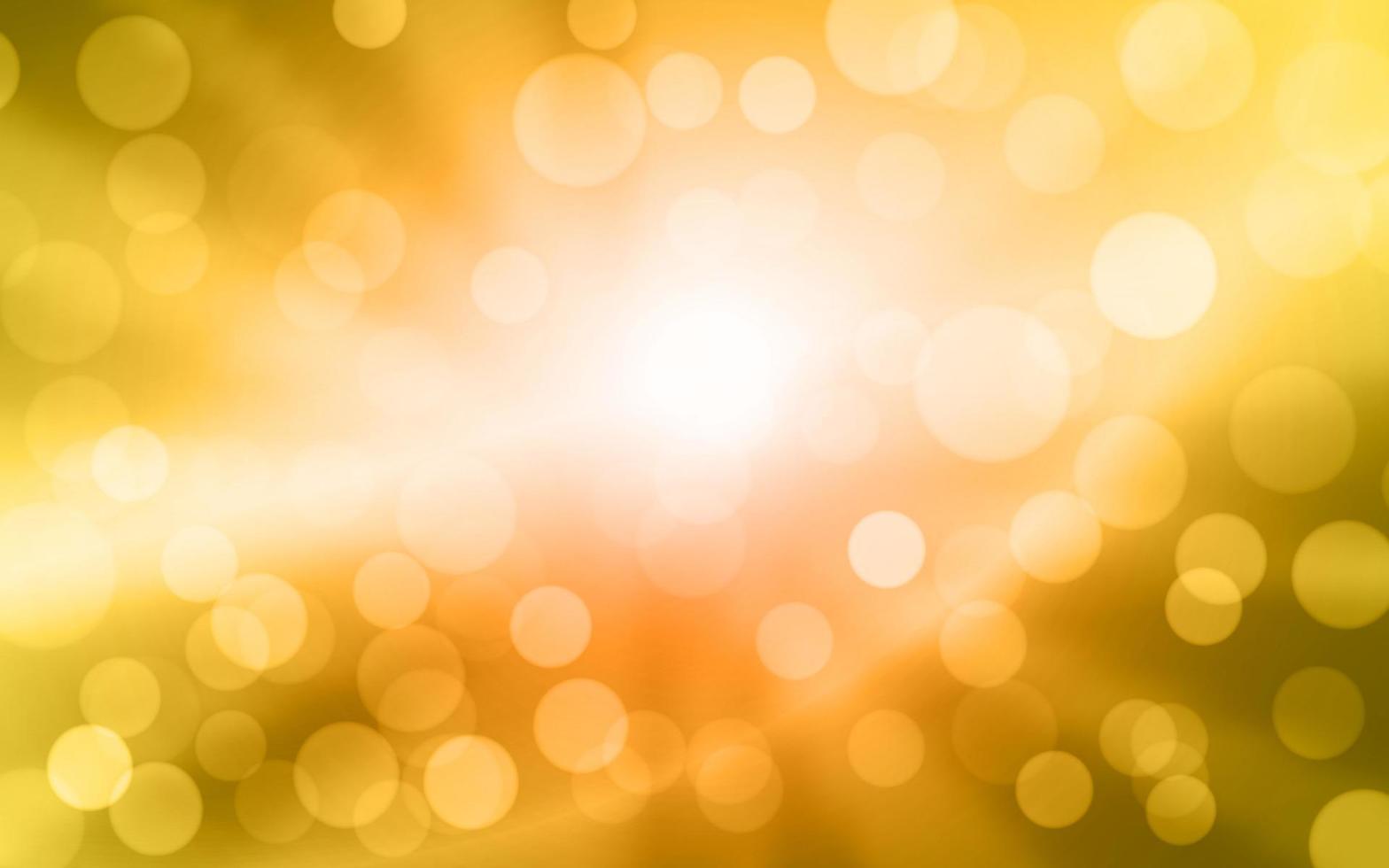 Blur golden bokeh abstract background with sunburst vector