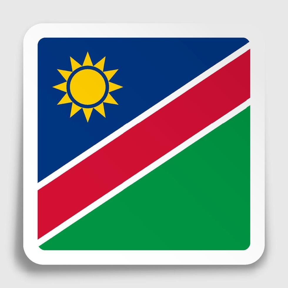 Icono de la bandera de Namibia en papel adhesivo cuadrado con sombra. botón para aplicación móvil o web. vector