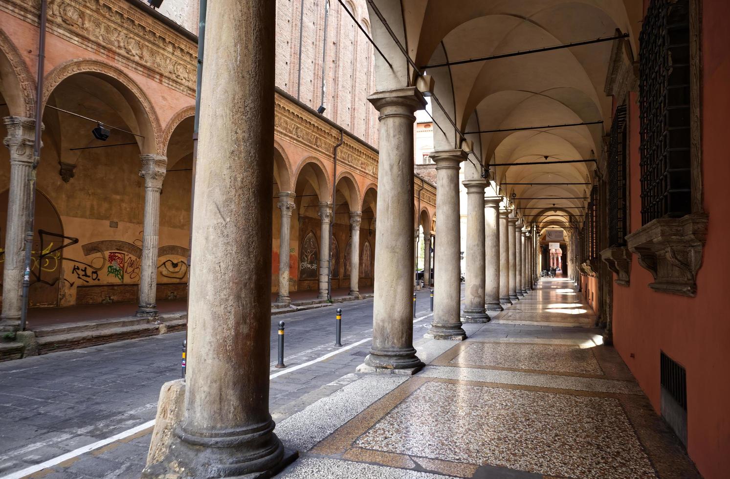 Famous arcade of Bologna. Via Zamboni. Unesco Heritage since 2021. Italy photo