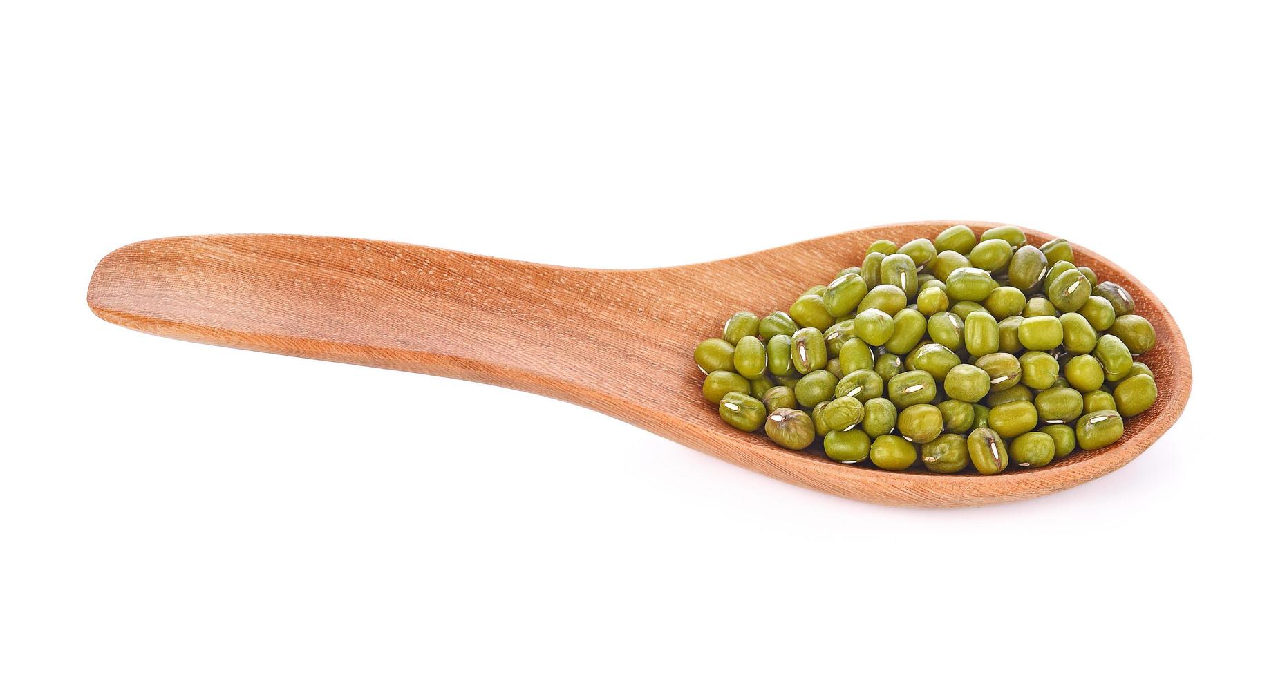 Mung Beans in wooden spoon on white background photo