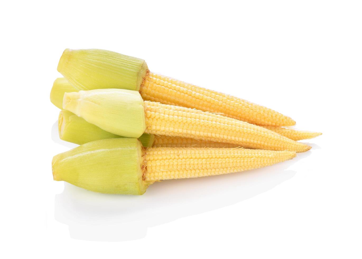 Baby corns isolated on white background photo