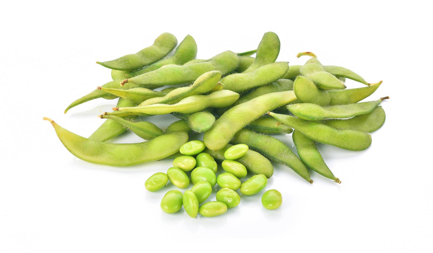 Green soybeans on white background photo