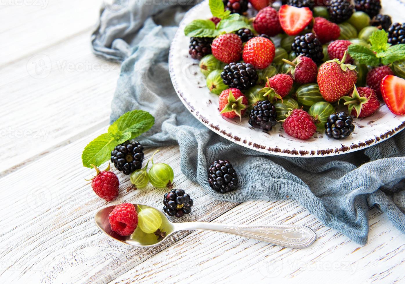 Plate with summer berries photo