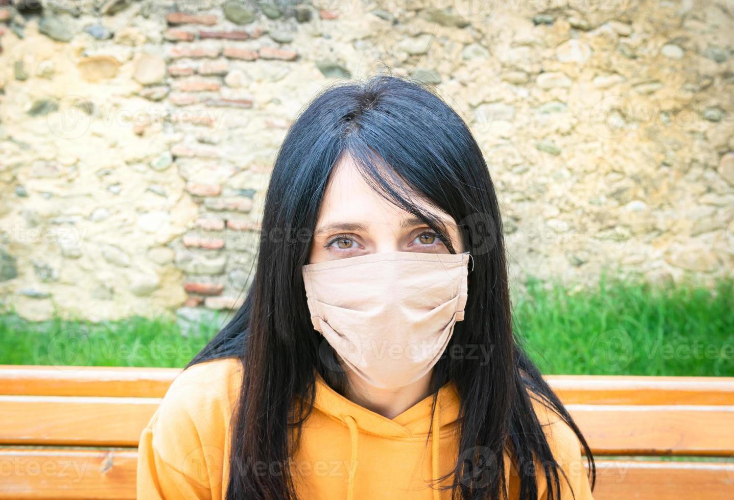 girl with mask look to camera photo