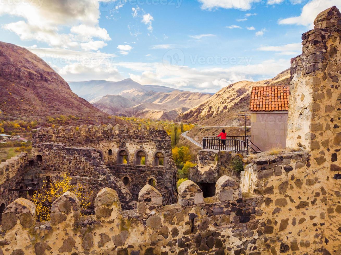 Girl on castle enjoy panorama photo