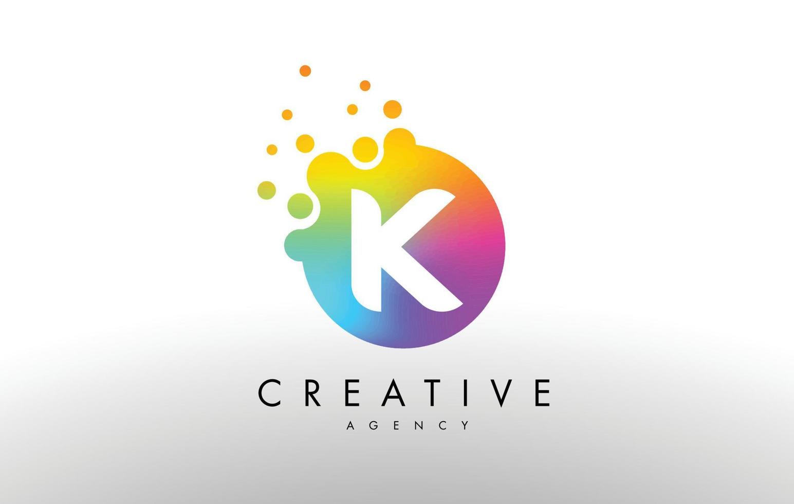 K logo de letra de puntos de arco iris. vector de diseño de letra con puntos de colores