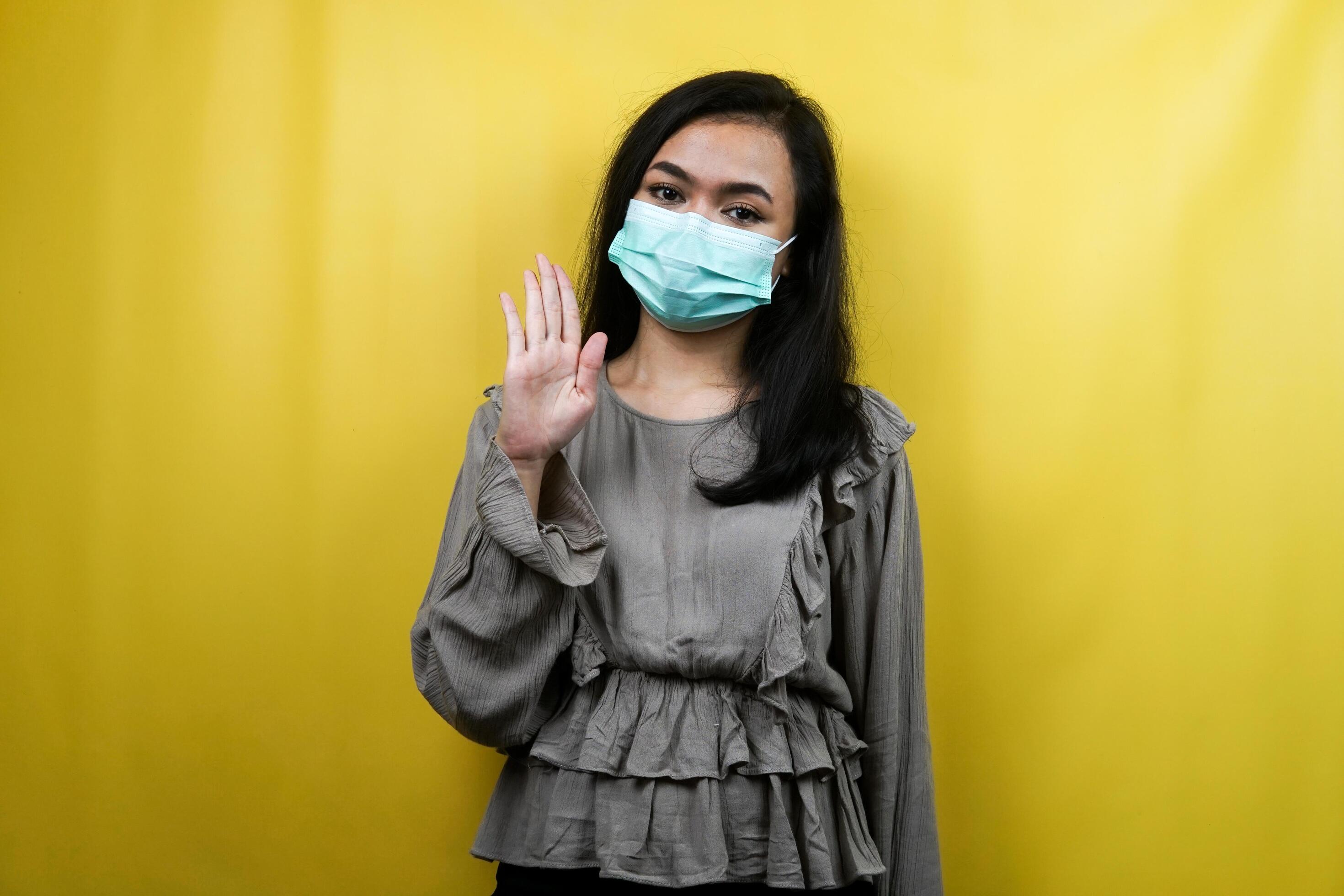Female Voice Saying Hello How Are You Download Beautiful young woman wearing a mask saying hello how are you isolated