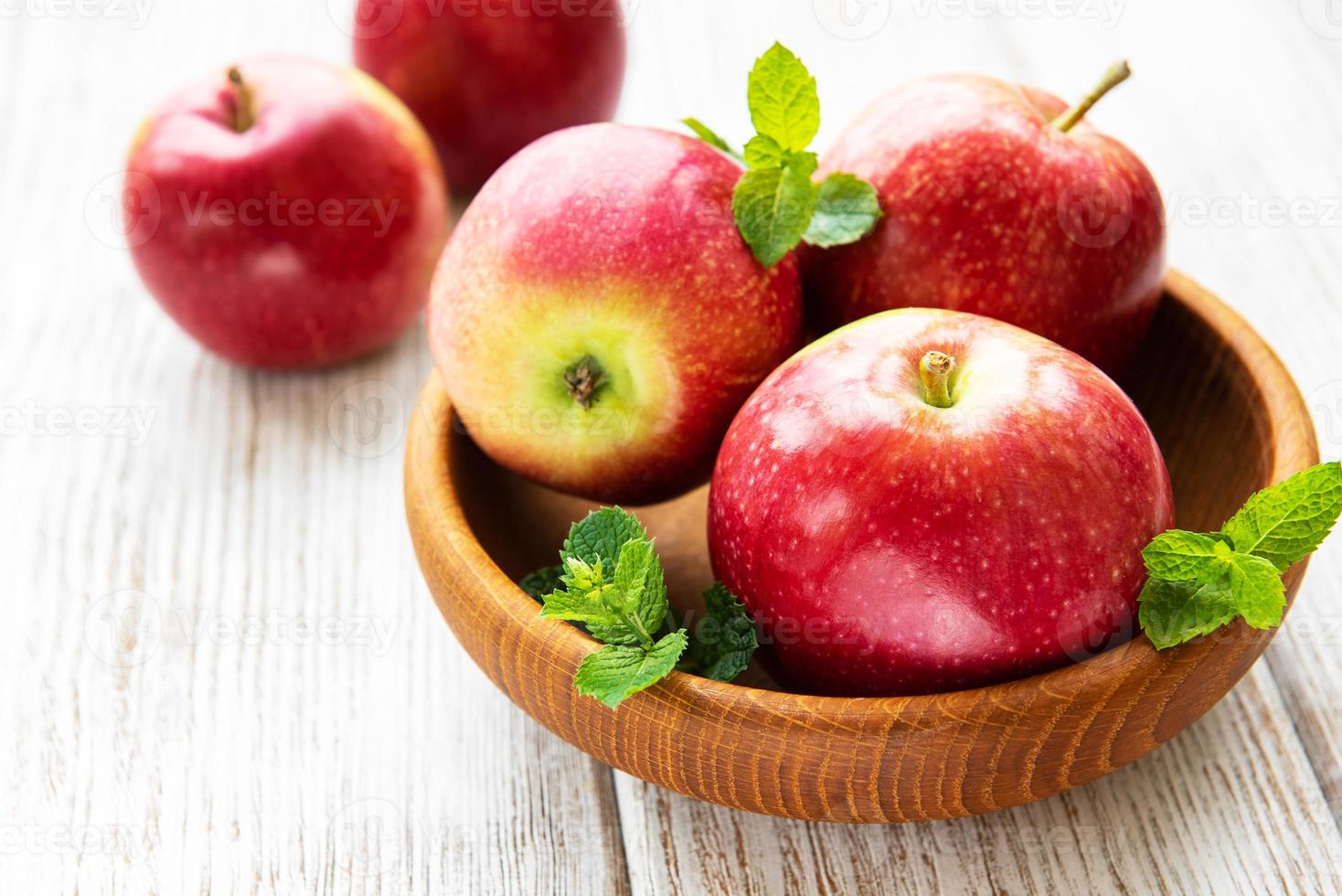 Bowl with red apples photo