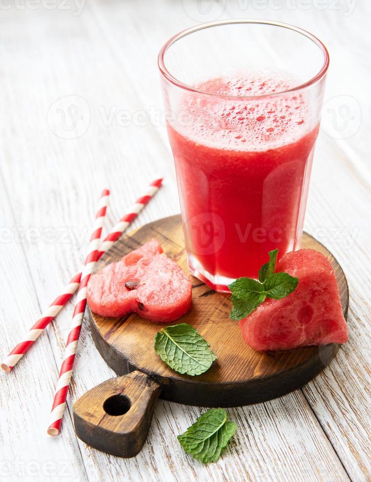 Watermelon smoothie and fresh watermelon photo