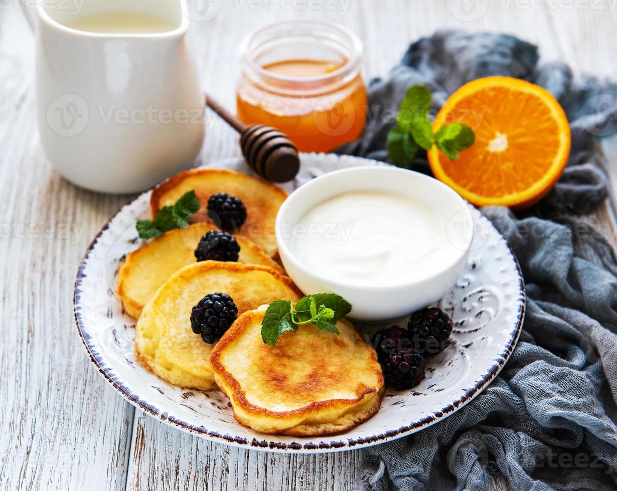 Delicious pancakes with blackberries photo