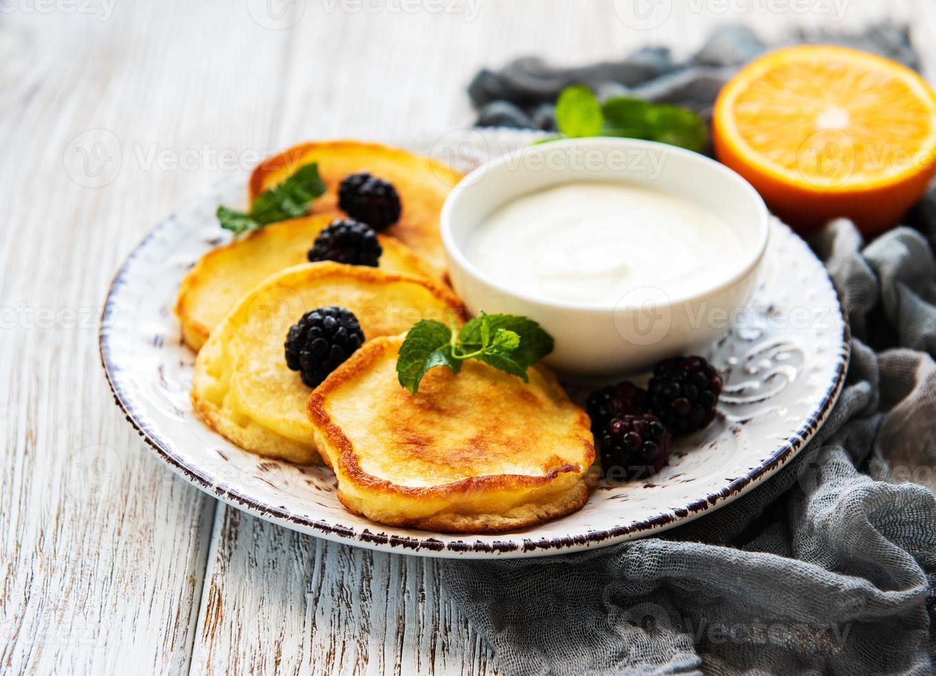 Delicious pancakes with blackberries photo