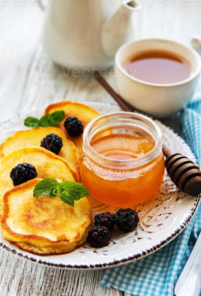 Delicious pancakes with blackberries photo