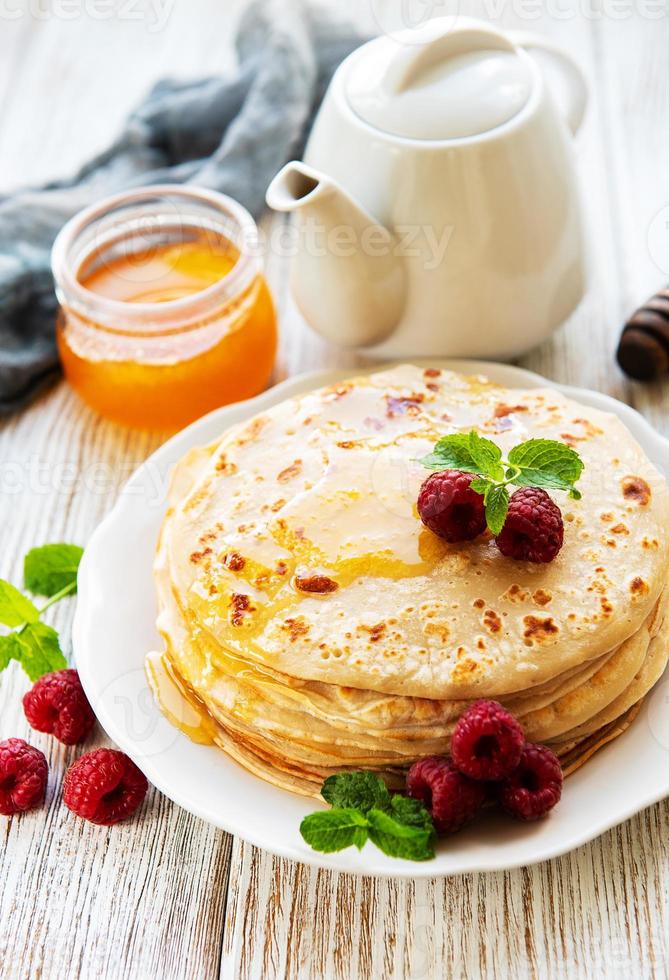 deliciosos panqueques con frambuesas foto