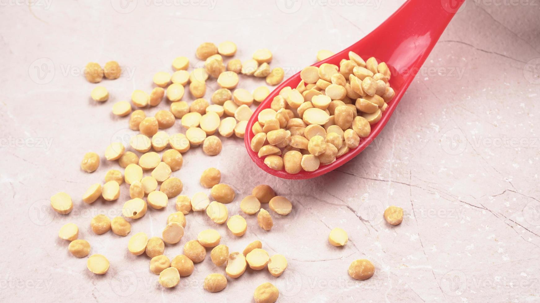 Black Chickpeas or Kala Chana with chana dal pulse isolated on wooden Background. photo