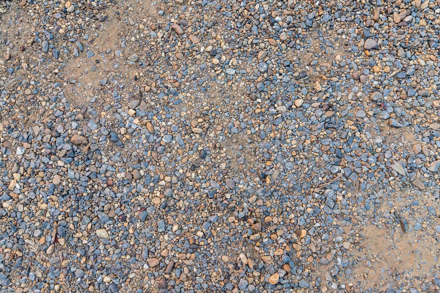 Colorful sand or pebble texture. Seamless texture on ground texture. photo