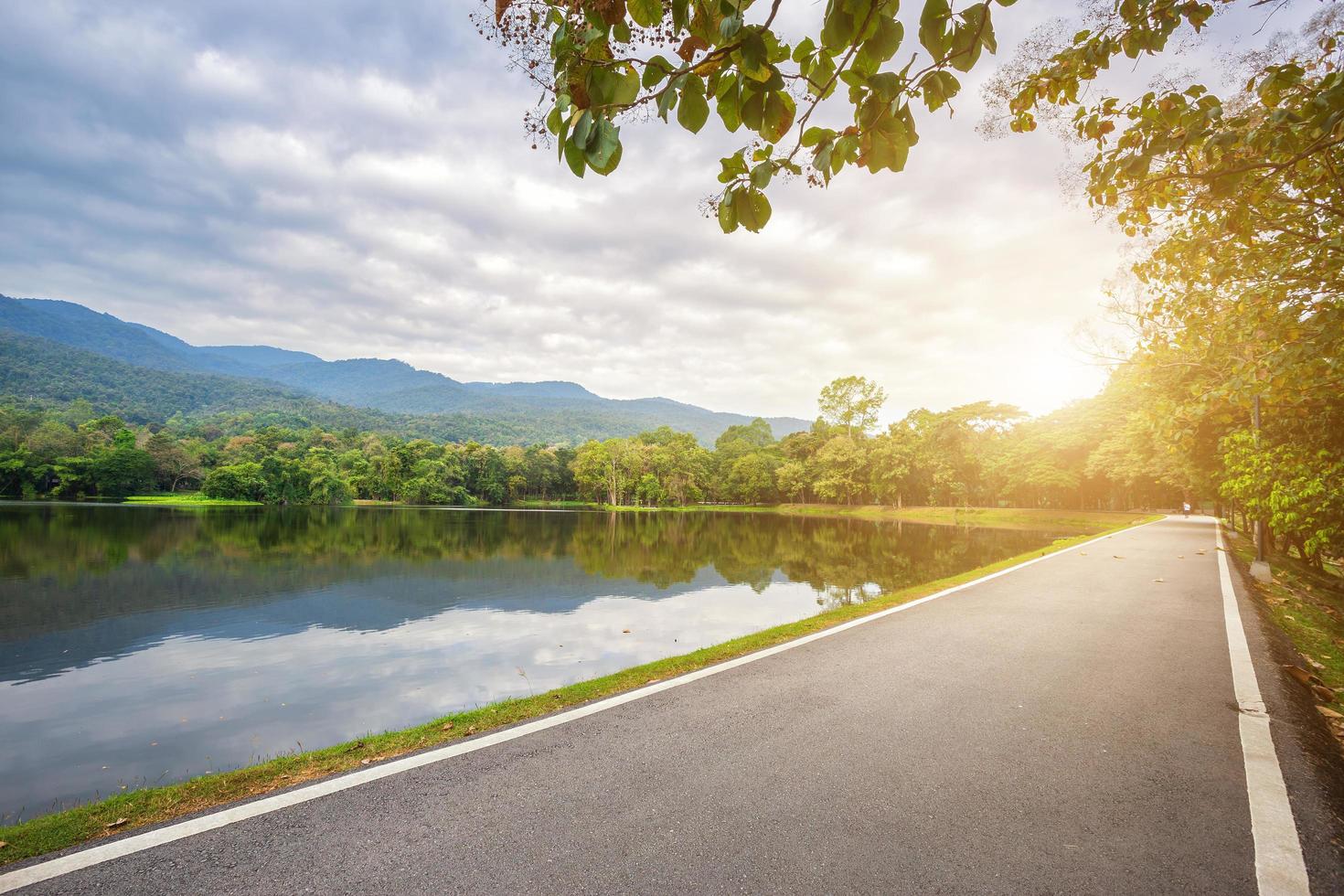 Along road landscape view in Ang Kaew Chiang Mai University Forested Mountain blue sky background with white clouds photo