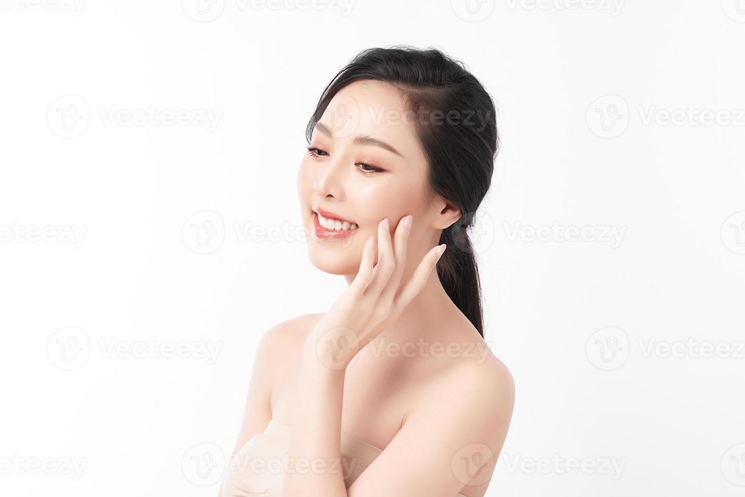 Beautiful young asian woman with clean fresh skin on white background, Face care, Facial treatment, Cosmetology, beauty and spa, Asian women portrait. photo